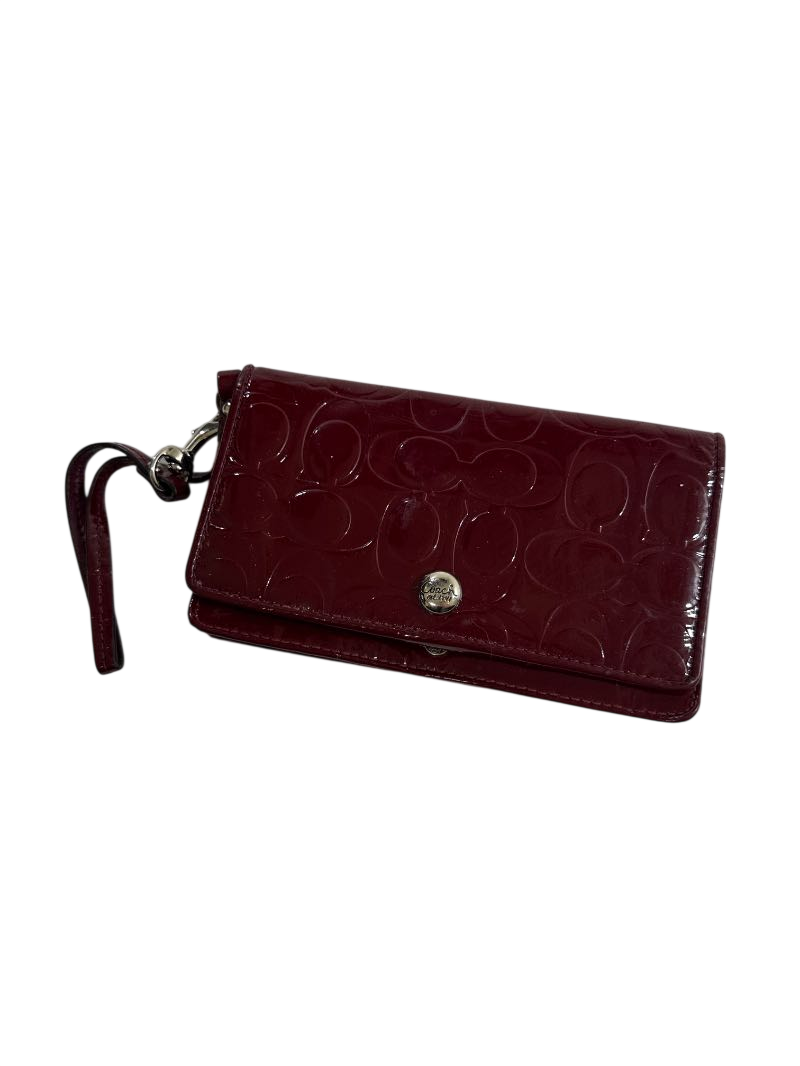 Coach Embossed wristlet Handbags