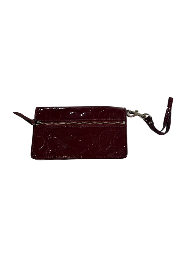 Coach Embossed wristlet Handbags